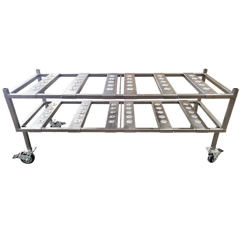 Close-up view of the 2-in-1 multi-directional roller system on an American Mortuary Coolers 2-tier rack, demonstrating end and side loading capabilities for max facility efficiency.