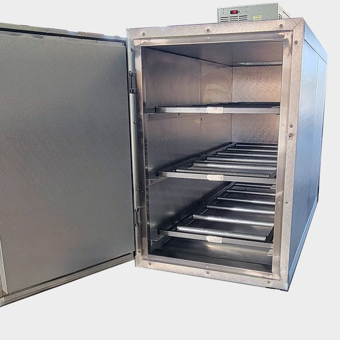 Interior view of the Model 3BX Extra Wide (XL) 3-body upright mortuary cooler by American Mortuary Coolers with the door open, showcasing the heavy-duty, built-in 3-tier roller racking system and extra-wide 36-inch door opening. Made in the USA.