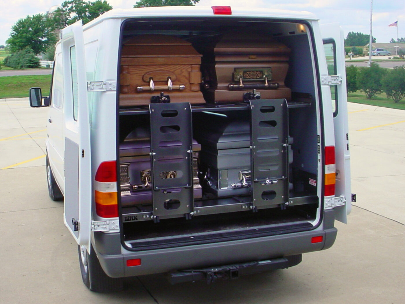 AME-DD4000 double-deck casket transport system — American Mortuary Equipment cargo van upfit for funeral home and mortuary use