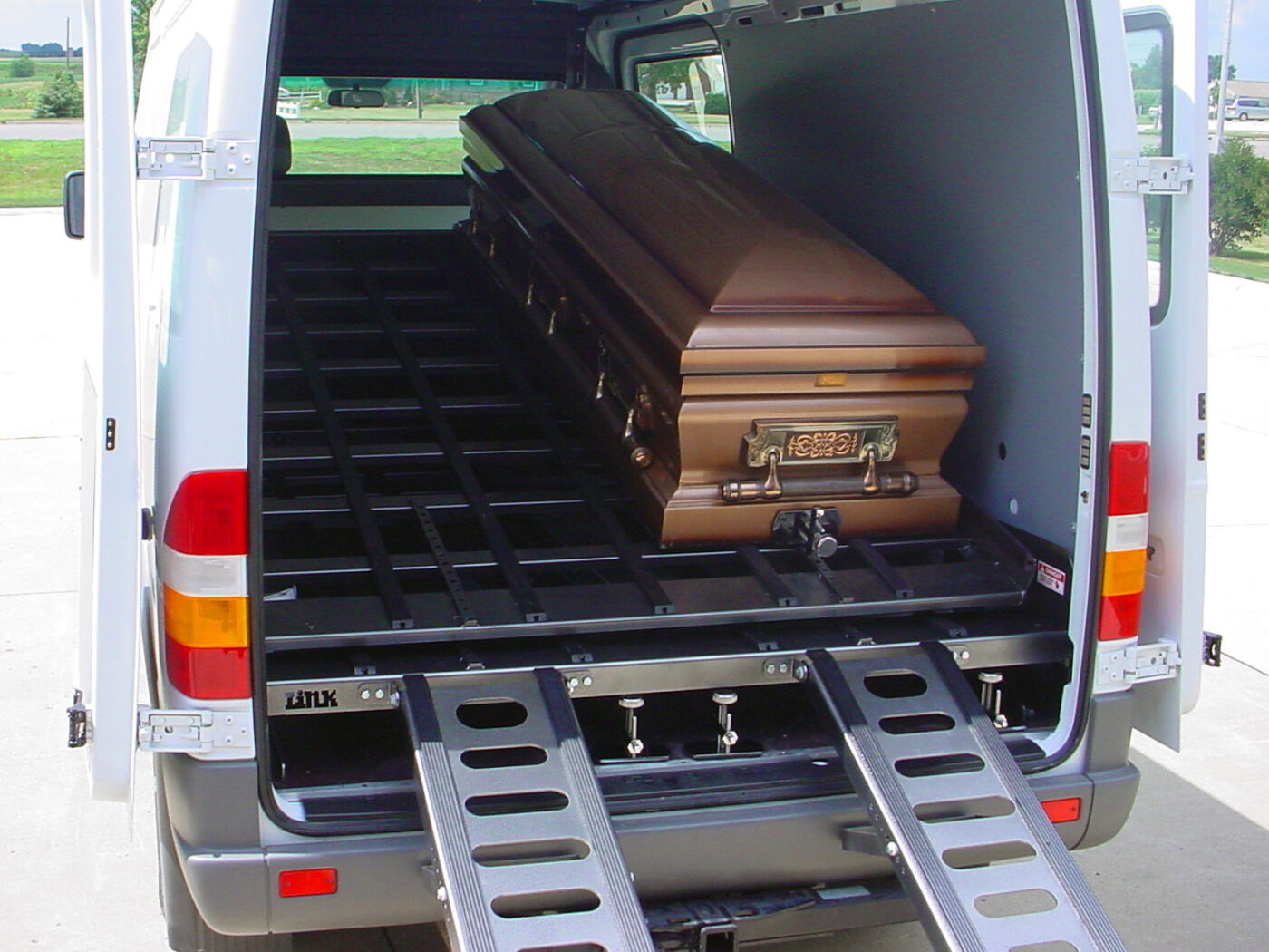 AME-DD4000 casket bumper arms and bier pin system — American Mortuary Equipment double-deck transport for Mercedes Sprinter 2500 and 3500
