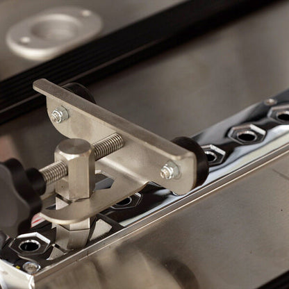 AME-SS150XLC bier pin plate mounting locations — American Mortuary Equipment oversize single-deck with two bier pin plates and four casket rollers for full-size cargo van transport
