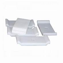 Small 5-piece plastic body positioner set for mortuary prep tables featuring chemical-resistant elevation blocks for drainage.