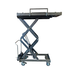 Funeral home scissor lift lowered to 20.5-inch loading height beside mortuary cooler