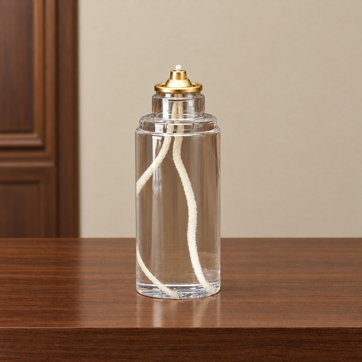 FS1 60-hour liquid paraffin oil candle shown on walnut showroom counter