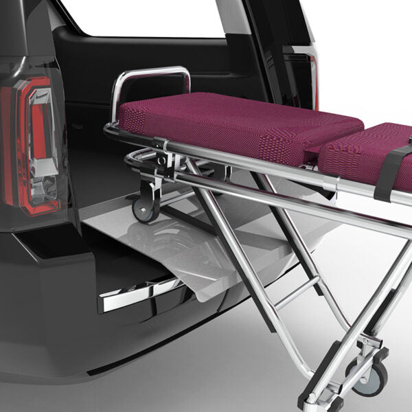 AME-SR50 fold-down bumper ramp in use loading position — American Mortuary Equipment no-drill suburban ramp for funeral home first call vehicles