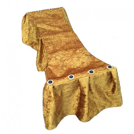 Gold crushed-velvet church truck drape with 12-pleat skirt covering a casket church truck