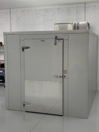 Remote-mounted refrigeration condenser for walk-in cooler